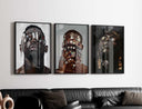 Black Men Wall Art Set of 3 displaying a serene expression of a man with adorned jewelry and cultural elements.