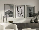 Black and white artwork highlighting a mouth with decorative grillz and shiny lips.