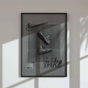 Alt view of sneakers in midair, integrating black and white tones with a crisp, modern aesthetic.