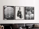Black and White Sports Poster Set highlights boxing gloves, a basketball, and vintage baseballs for elegant decor.