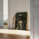Cosmic Explorer print leaning against the wall, featuring an astronaut amid vibrant greenery.