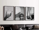 Print depicting a hand grasping a woman's leg in high heels, adding a bold fashion statement to any space.