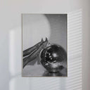 Close-up of a hand holding a woman's leg in high heels, a striking addition to fashionable wall art.
