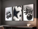 HYPEBEAST Designer Poster Set of 3 showcasing striking street art designs perfect for modern wall decor.