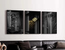 Artistic presentation of golden dice, reflecting light against a dark backdrop, part of the wall art collection.