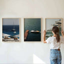 Coastal landscape print featuring a boat and calming sea, ideal for adding serenity to your living space.
