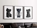 Minimal Hypebeast Prints Set of 3 featuring KAWS designs, showcasing unique black sculptures in modern art style.