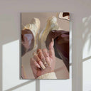 Detailed view of Pink Black Girl Poster focusing on hands with stylish nails and sneakers.
