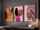 Stylish wall display of Pink Black Girl art with floral, empowering themes.