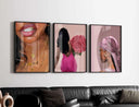 Profile of a woman with a pink scarf and earrings, part of the Pink Black Women Wall Art Set.