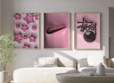 Stylish wall art with a pink background featuring a sleek Nike logo, perfect for modern spaces.