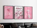 Vibrant Pink Hypebeast Wall Art Set featuring three distinct KAWS-inspired prints for stylish decoration.