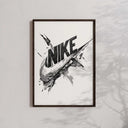 Creative representation of "NIKE" logo artistically breaking through a surface, adding a dynamic touch.