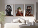 Set of 3 Black Men Wall Art Prints featuring Afrocentric digital wall art in a modern living room, printable art by Haus of Prints.