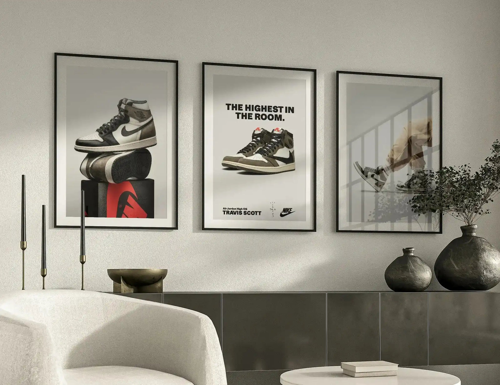 Framed posters on a wall with a modern interior setting