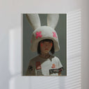 Urban Bunny Muse Surreal Fashion Art Print framed on a wall, featuring shadows and light play in the room.