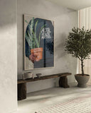 Hands holding a potted plant, part of the Urban Masculine Wall Art set, highlighting a blend of nature and culture.