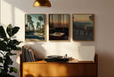 Vintage Cityscape Poster Set of 3 featuring an artistic display of palm trees in a sunny street.
