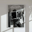 Black and white vintage fashion photography print of woman reading Vogue magazine on beach chair, printable wall art by Haus of Prints.