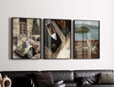 Vintage Trendy Gallery Wall Art Set of 3 featuring framed digital prints of vintage car, boats, and coastal scenes in modern living room — Haus of Prints.