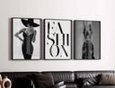 Vogue-inspired typography saying "FASHION" in bold black lettering against a minimalist background.