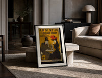 Man and woman drinking absinthe at table print in a black frame leaning on a travertine table in a sunlit lounge