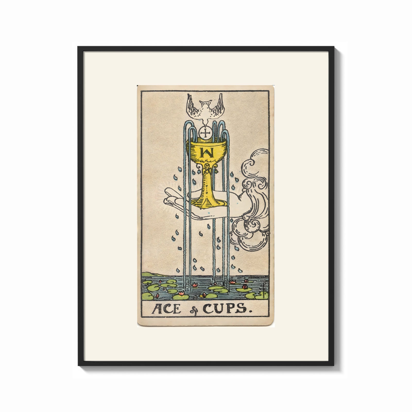 Framed Ace of Cups tarot card print shown as a bold statement piece on a clean gallery wall
