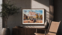 London Admiralty Arch and street scene print in a wood frame above a fluted sideboard beside an olive tree