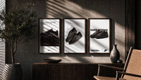 Air Jordan 1 Low Travis Scott triptych in three walnut frames above a sideboard in a warm room
