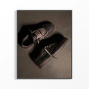 Air Jordan 1 Travis Scott Velvet Brown Dark Mocha sneakers displayed in a framed artwork against textured brown surface