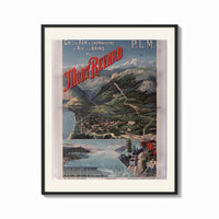 Framed Alpine mountain and lake landscape print shown as a bold statement piece on a clean gallery wall