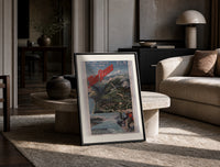 Alpine mountain and lake landscape print in a black frame leaning on a travertine table in a sunlit lounge