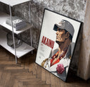 Marine admiral in profile poster in a black frame leaning beside a shelf in a raw-plaster loft