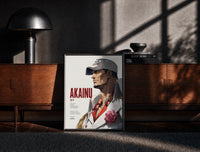 Black-framed Marine admiral in profile print on a moody console with designer coffee-table books