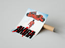 Boy and red motorcycle poster styled above furniture in a modern room