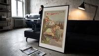 Algerian woman in traditional dress print in a slim black frame leaning on a dark sofa in a concrete print studio
