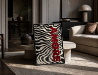 Amore Zebra Print on the floor, leaning against a travertine table