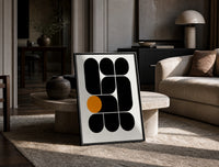 Arches Composition print on the floor, leaning against a travertine table