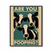 Framed Are You Pooping Three Cows print shown as a bold statement piece on a clean gallery wall