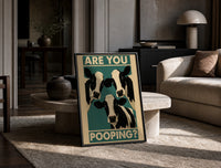 Are You Pooping Three Cows print on the floor, leaning against a travertine table