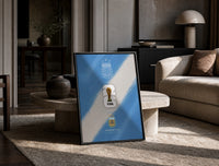 FIFA World Cup 2026 Argentina logo print in a black frame leaning on a travertine table in a sunlit lounge