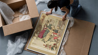 Woman with children playing indoors framed print being unpacked from protective bubble wrap and a box