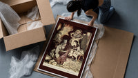 Old man and figures examining cloth framed print being unpacked from protective bubble wrap and a box