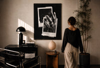 ASAP Rocky At Long Last Rings print in a black frame on a sunlit plaster wall, a person looking on beside a mushroom lamp
