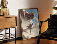 Brass-framed anime soldier battling colossal titan print leaning in a warm styled corner by a sculpture