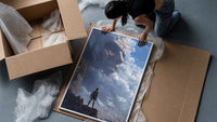 Soldier facing colossal titan framed print being unpacked from protective bubble wrap and a box