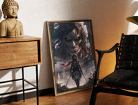 Brass-framed Anime warrior with red scarf and titan print leaning in a warm styled corner by a sculpture