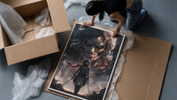 Anime warrior with red scarf and titan framed print being unpacked from protective bubble wrap and a box