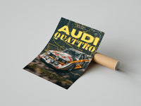 Audi Sport Quattro S1 rally print lying flat beside a brown cardboard shipping tube on a grey surface
