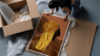 Back View in a Gold Durag framed print being unpacked from protective bubble wrap and a box